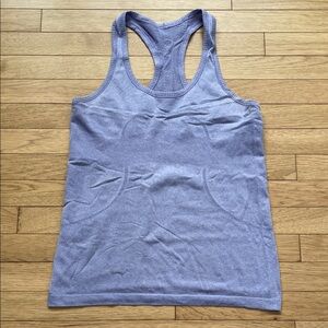 Swiftly tech racerback size 8 purple Lululemon